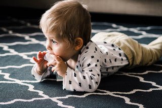 Breastfeeding Your Teething Baby: Ouch? - Milky Mama