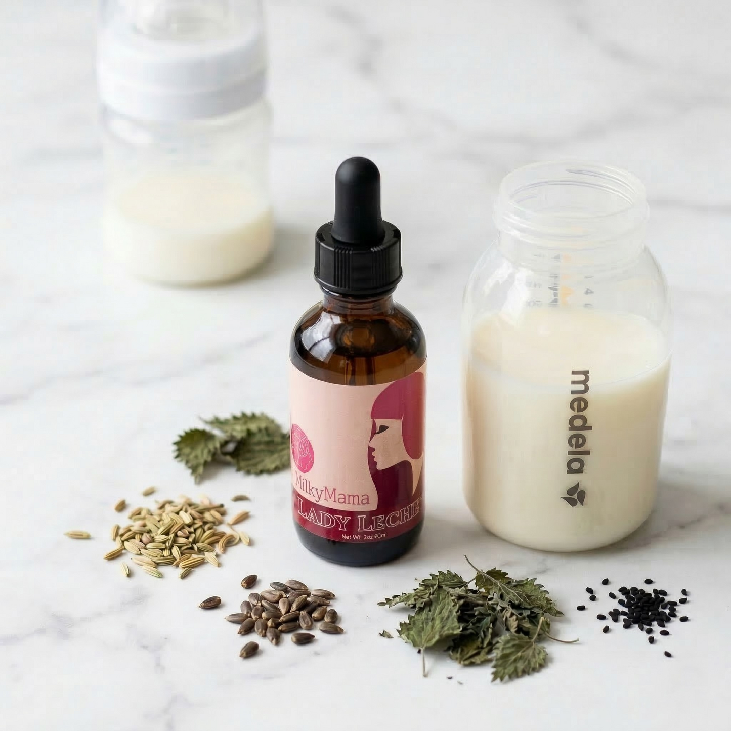 Bottle of Milky Mama Lady Leche with dried herbs and a Medela bottle on a marble surface