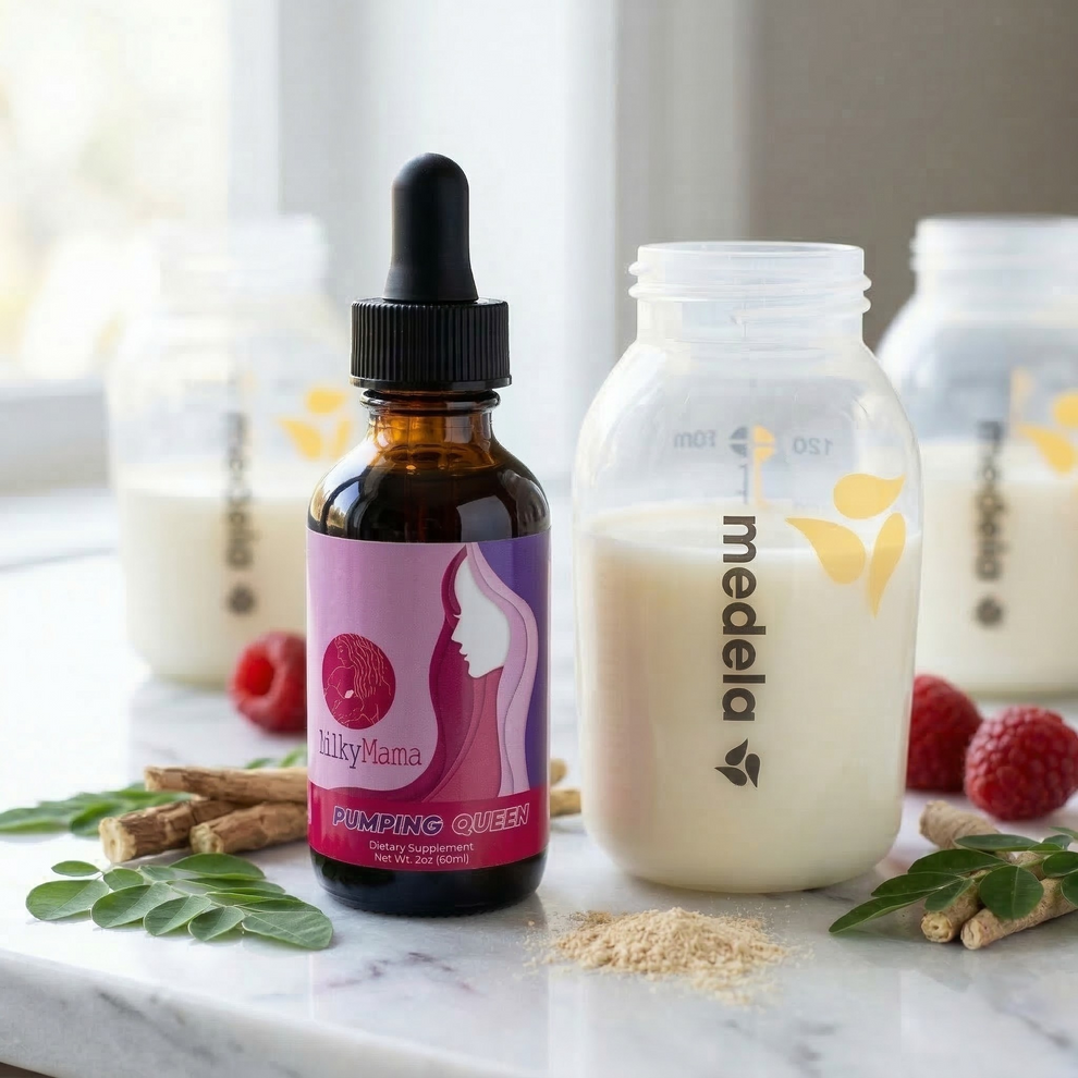 Bottle of MilkyMama supplement and Medela bottle on a marble surface with raspberries and cinnamon sticks.