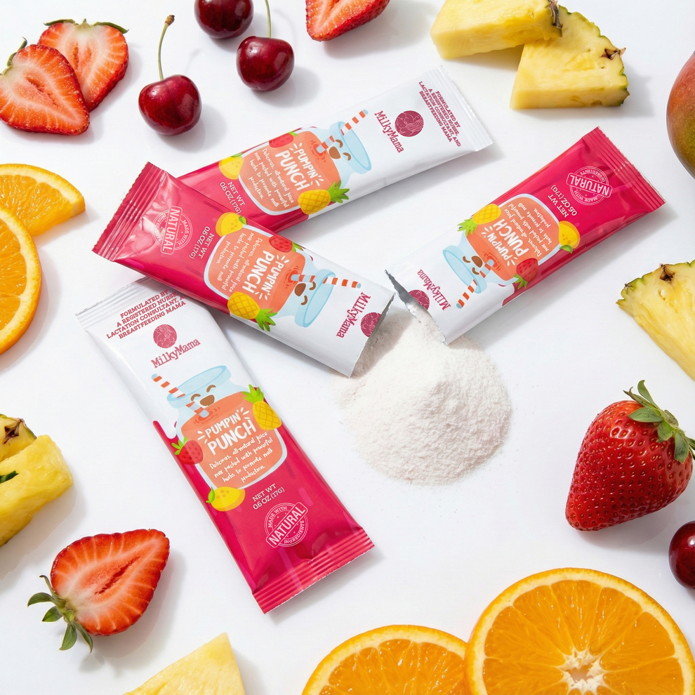 Fruit-flavored powder packets with fruits on a white background